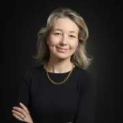 headshot of woman in black shirt 