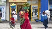 Women walk through the street in Rwanda