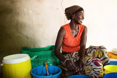 A Senegalese woman at her market stand