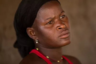 Cotton farmer in Camela, Titimane, Mozambique. Photo by Allison Shelley for CGAP