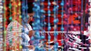 An Ecuadorian woman sells jewlery