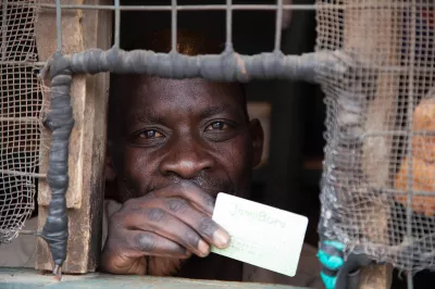 Man behind counter in Kenya